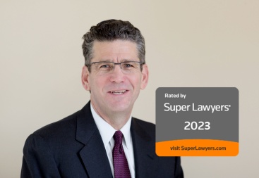 Doug Maynard Headshot with Super Lawyers 2023 Badge