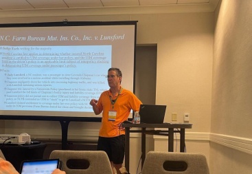 Doug Maynard presenting the 2021–2022 insurance law updates during a continuing legal education session at the NCAJ summer convention in Charlotte, NC.
